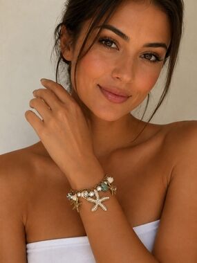 Gold Starfish Charm Bracelet with Shell Accents